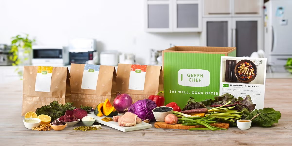 Green Chef meal kit with fresh ingredients and recipe cards