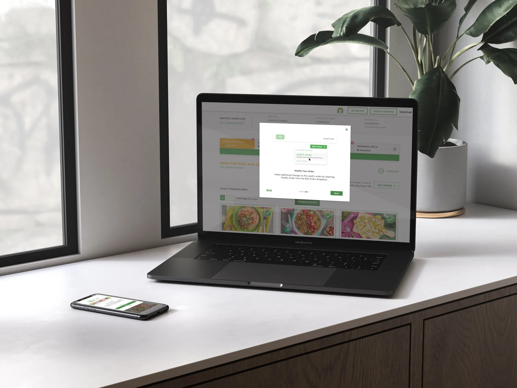 Green Chef carousel onboarding displayed on MacBook Pro and iPhone